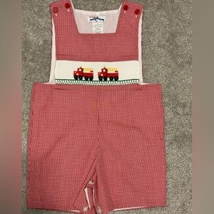 Silly Goose fire truck smocked romper. Size 2T.